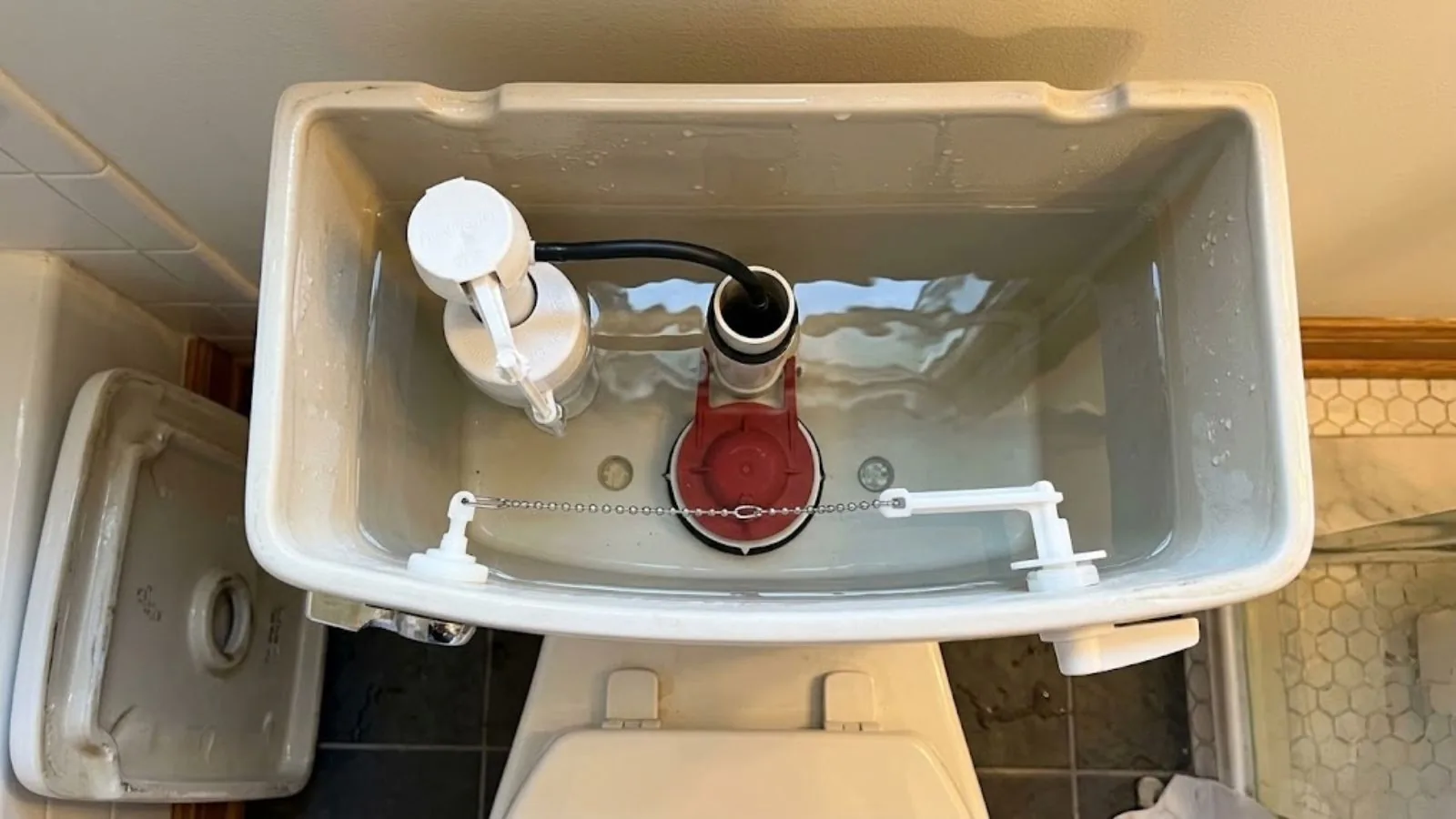 Why Your Toilet Won't Stop Running (and When to Call a Plumber)